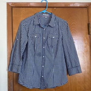 A medium, button down shirt. No tags, but clean and not worn. 100% cotton.